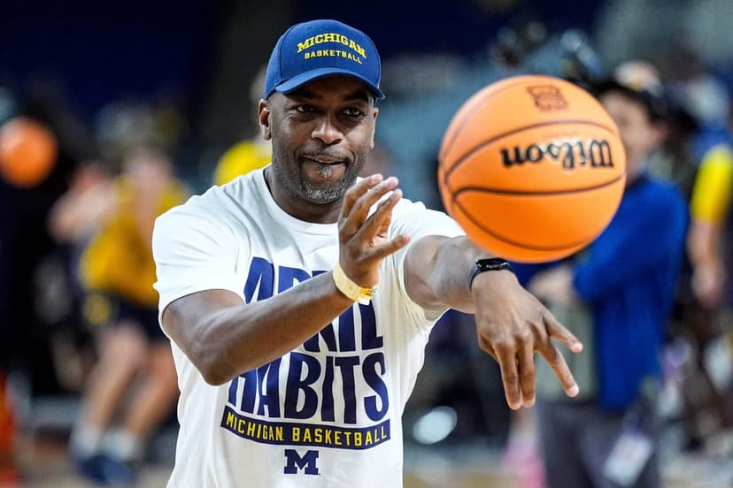 Interim Coach Fights to Keep Michigan's Title Hopes Alive