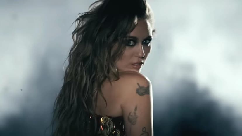 Miley Cyrus Ignites 'Dream As One' With Fiery Video