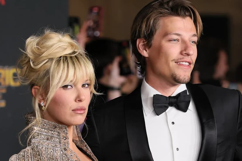 Millie Bobby Brown Shields Newborn from Paparazzi as Husband Trails Behind