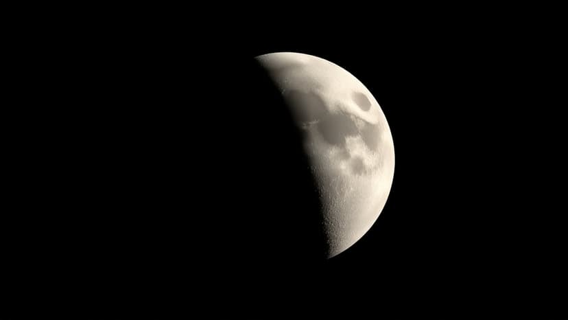 Cosmic Duo: Moon Hugs Saturn in Night Sky