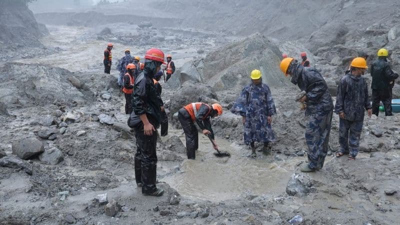 Nepal Flood Survivors Emerge From Flooded Tunnels