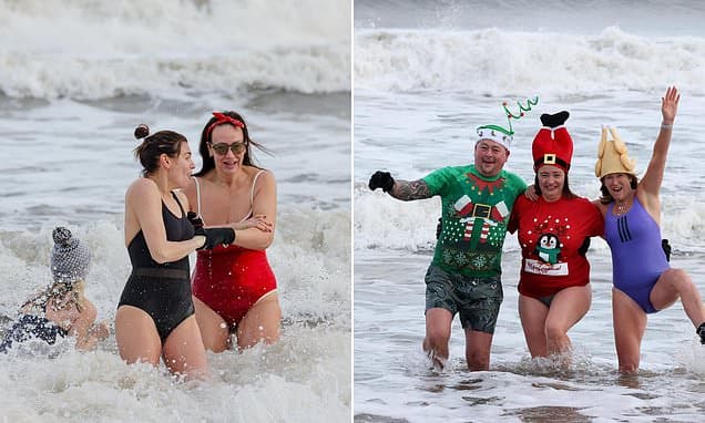 Icy Plunge: Brave Swimmers Dive into 2026 Freezing Waters