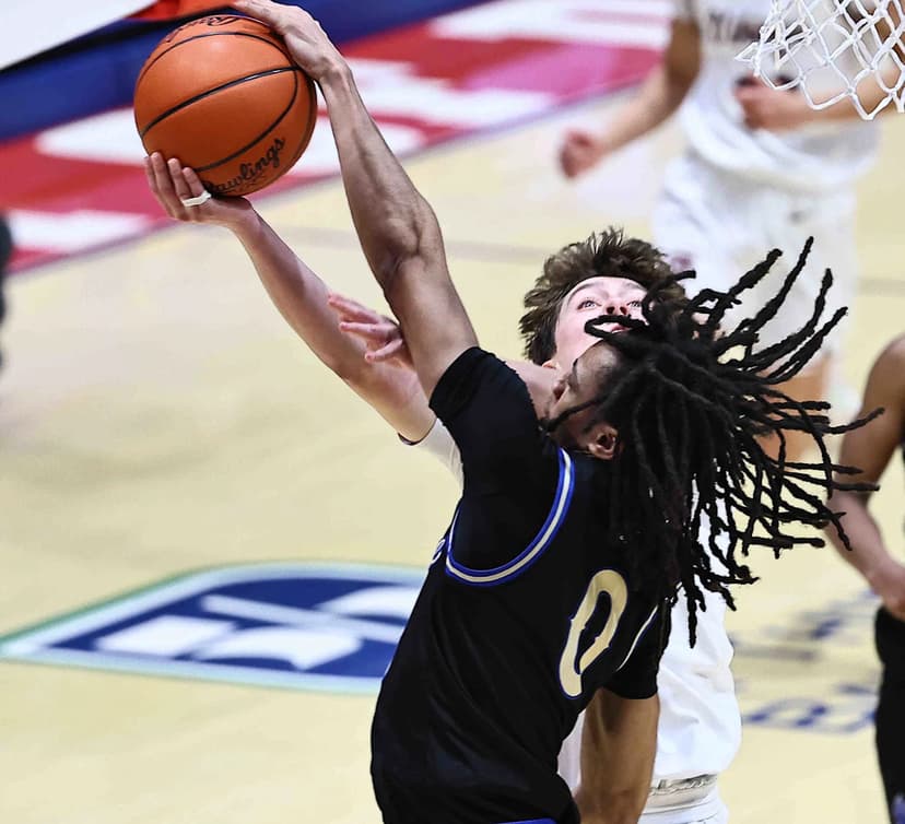Ohio State Hoops Courts Top Recruits at Football Game