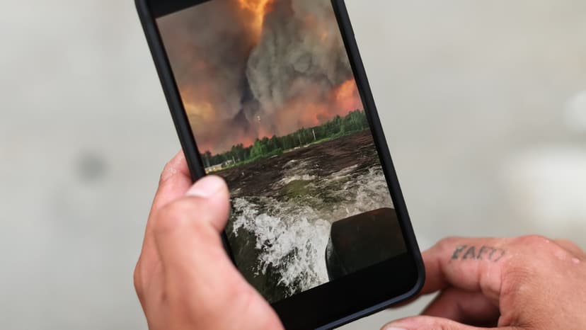 Wildfire Fury: Ontario Community Flees by Boat