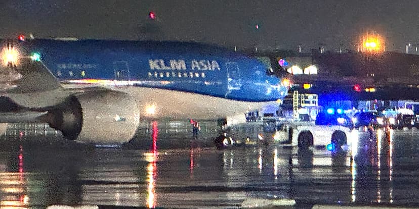 Passenger Deploys Emergency Slide Mid-Flight