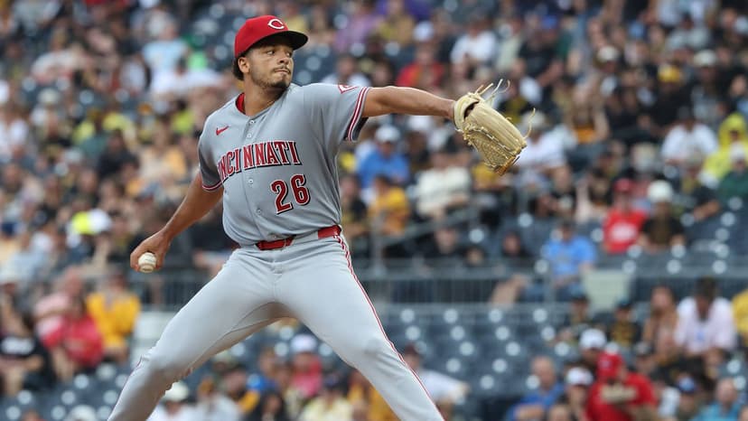 De La Cruz, Burns Power Reds to Victory