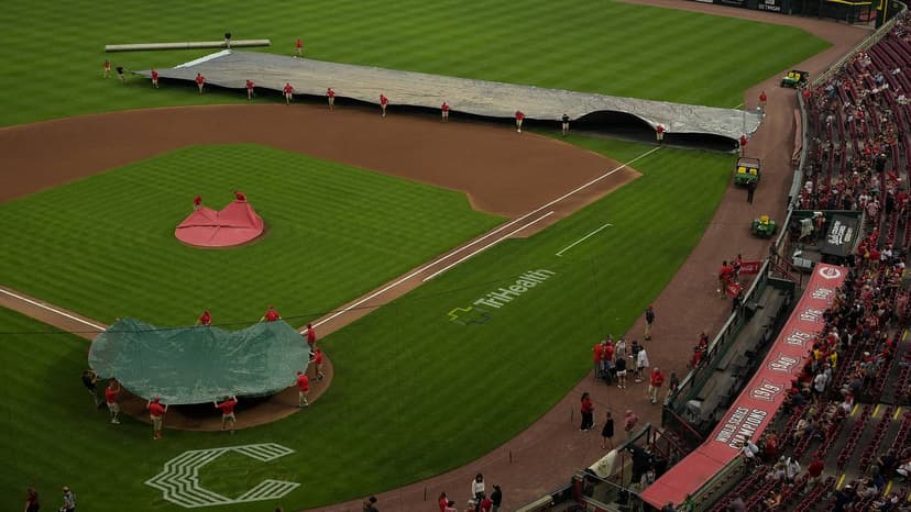 Brewers Lead Reds Before Rain Stops Play
