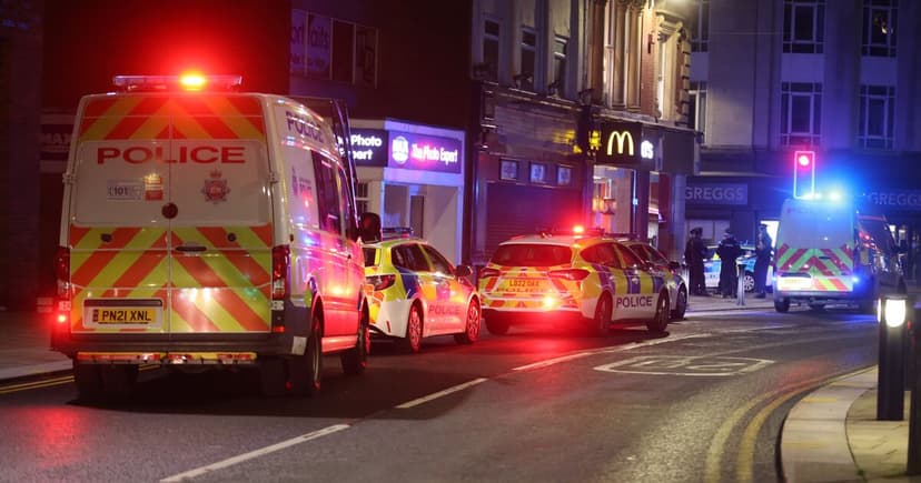 Riot-Trained Police Intervene to Disperse Unruly Crowd in Bolton