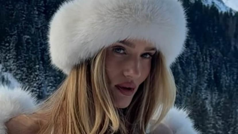 Rosie Huntington-Whiteley stuns in sheer lace lingerie gown