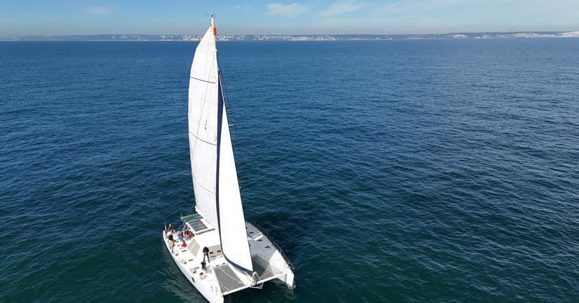 Sailboat crosses English Channel, a green transport.