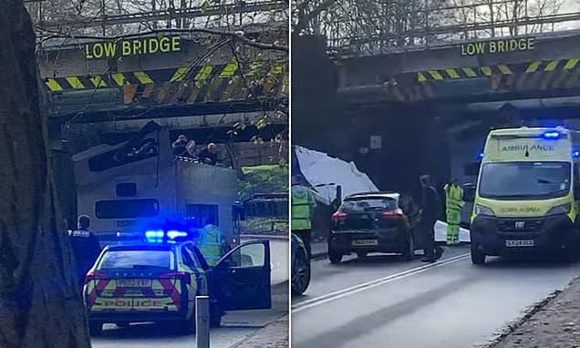 School bus roof ripped off hitting Lancashire bridge
