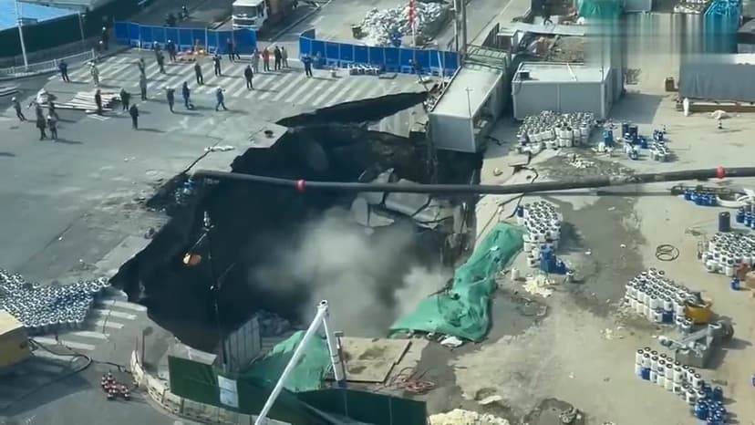 China Road Collapses: Workers Flee Massive Shanghai Sinkhole