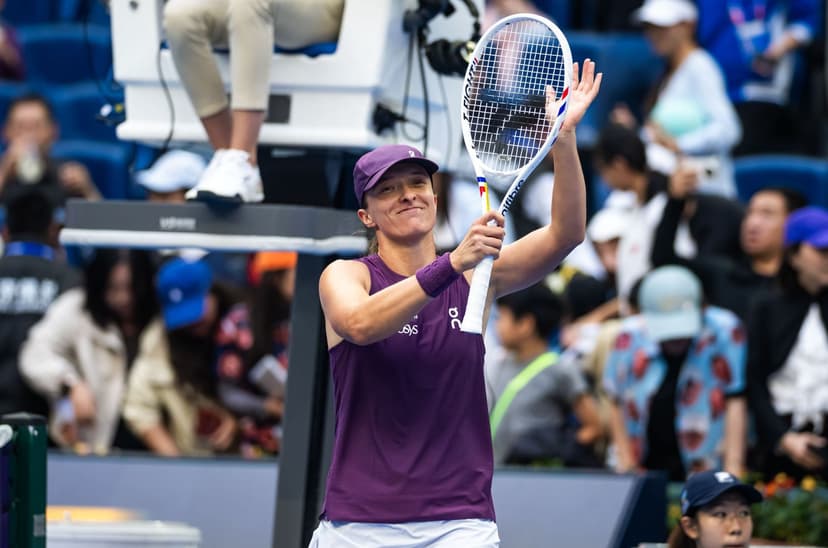 Swiatek Powers Past Mertens in China Open Thriller