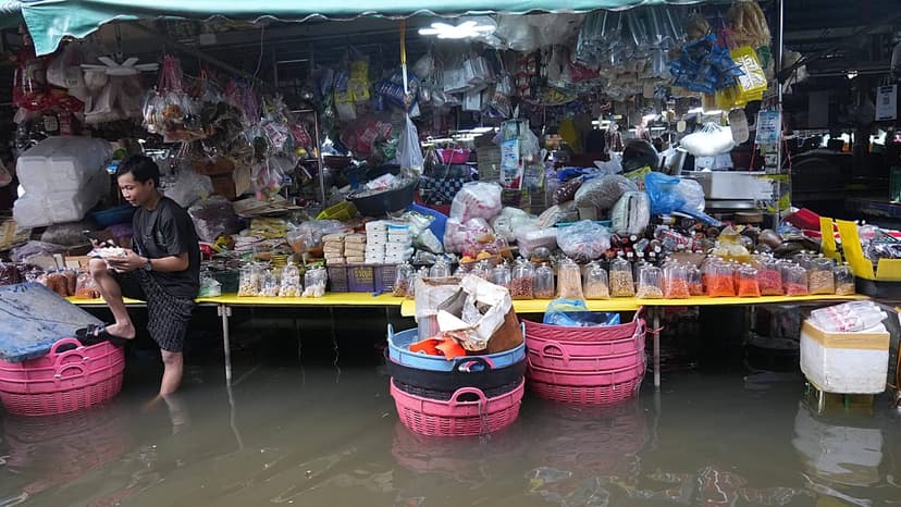 Thai Villages Submerged as Flood Defenses Aid Cities