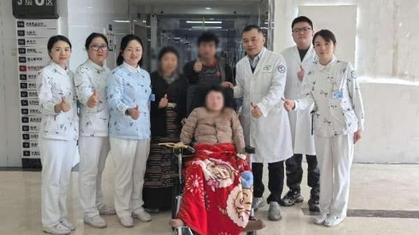 Tibetan woman walks again after 14 years