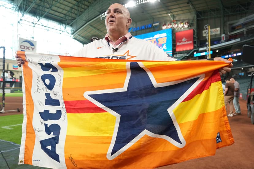 Tattooed Traveler Donates Astros Flag After 150,000-Mile World Tour