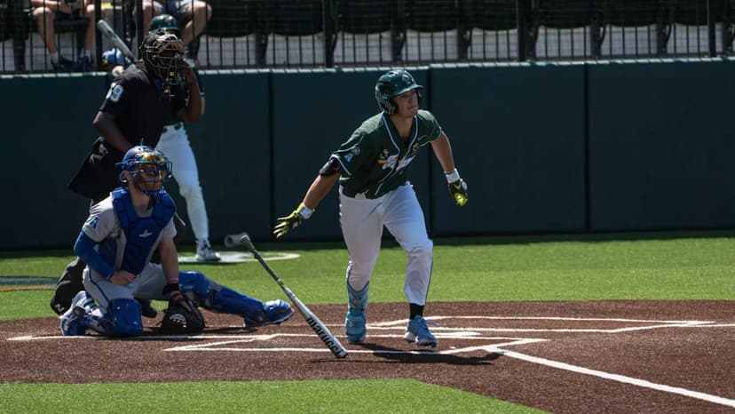 Green Wave Routs Tigers in Run-Rule Victory