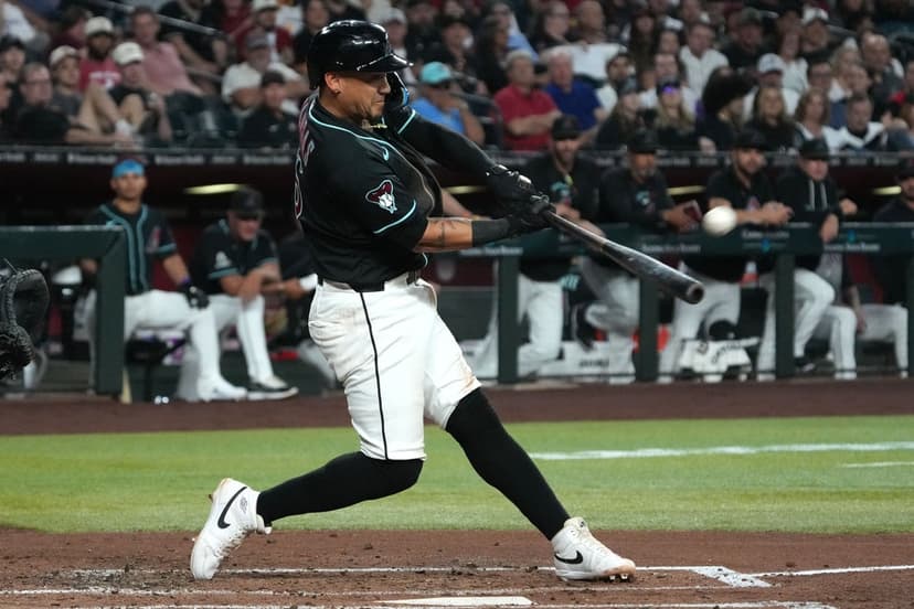 Vargas Powers D-backs Past White Sox in Slugfest