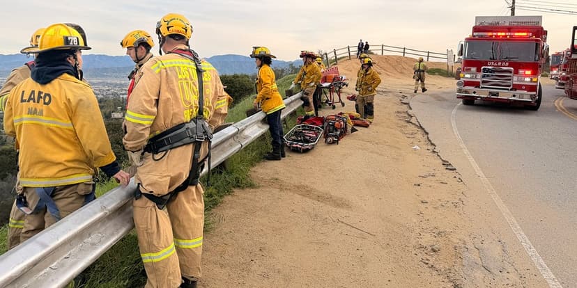 Woman Rescued After Cliffside Vehicle Plunge