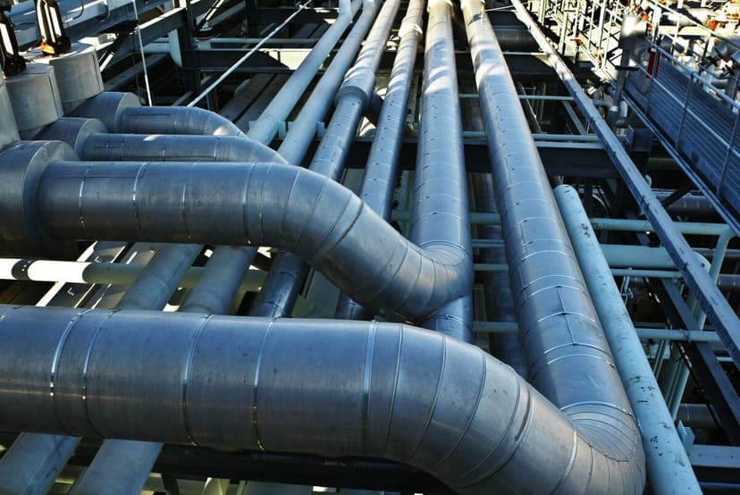 Woodside Energy Boosts Dividend Amid Profit Slump