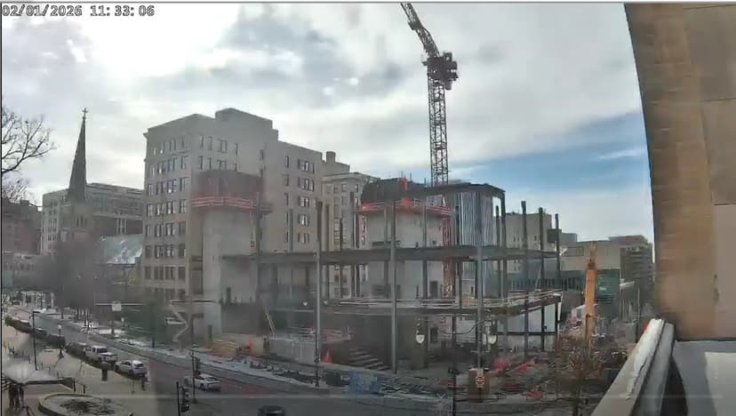 Crane Beam Plummets: Worker Injured at History Center Site